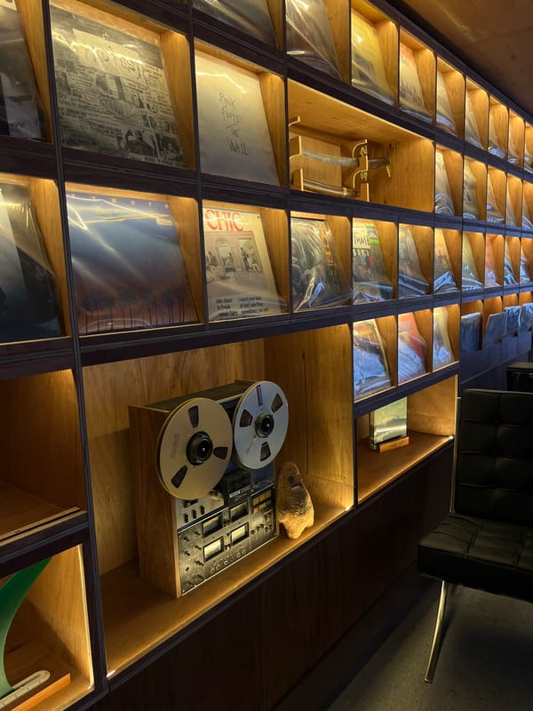 Inside a Bali lifestyle complex mixing surf, vinyl, and cafe vibes