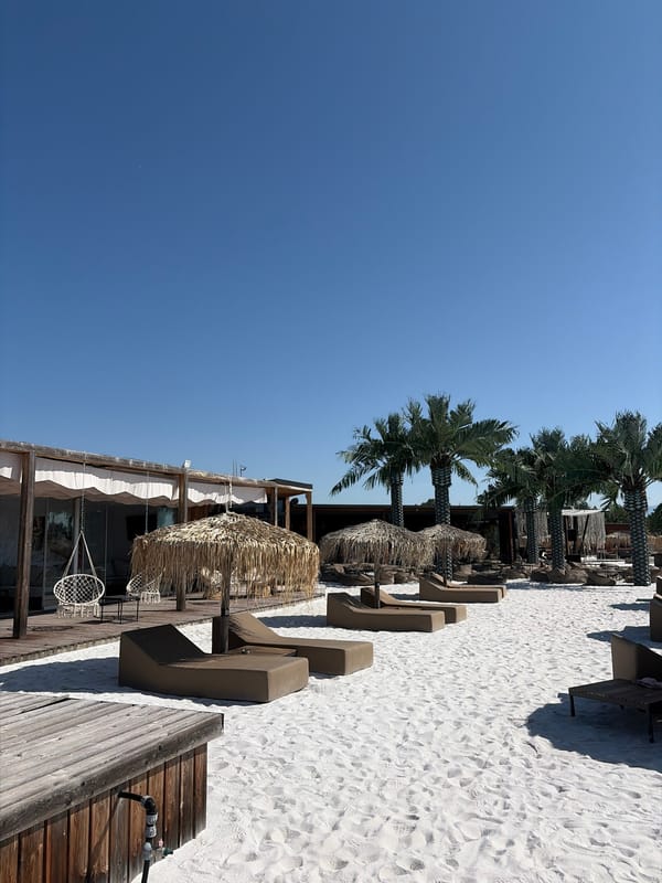 Sunny resort scenes: pool, sand, and lounge chairs in Bulgaria