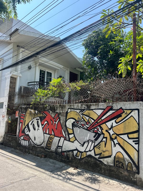 Early morning documentation captures street art and urban life in Bắc Nha Trang
