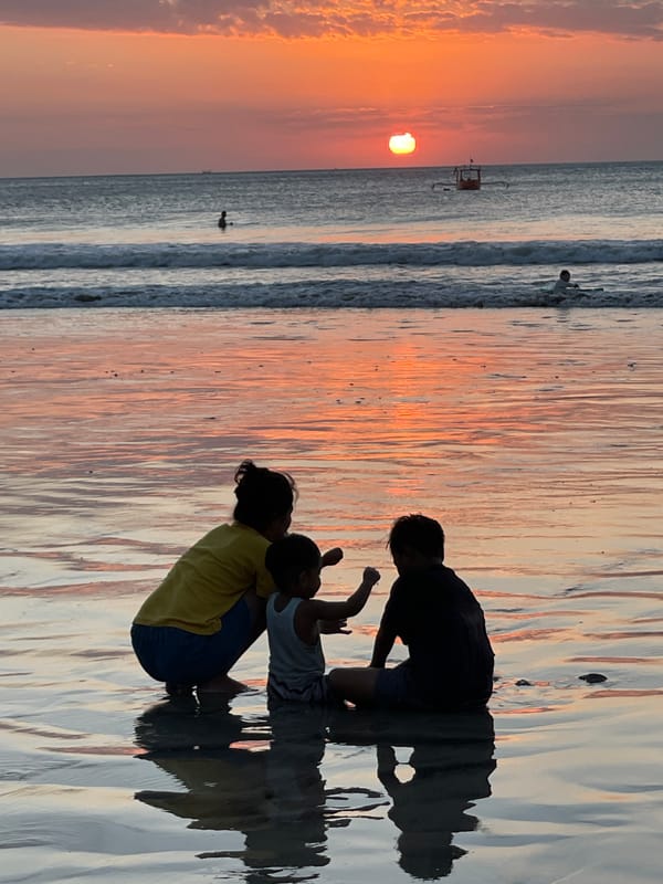Sunset crowd fills Kuta Selatan beach, Bali