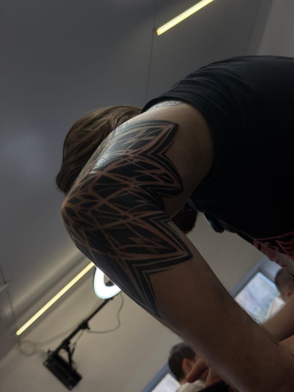 Geometric tattoo sleeve documented in Orenburg, Russia