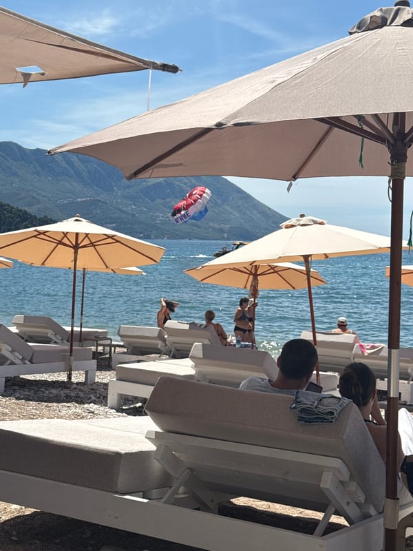Budva summer morning: beach, streets, and Old Town