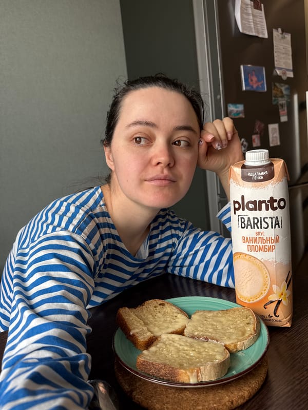 Woman takes morning selfie with plant milk in Izhevsk