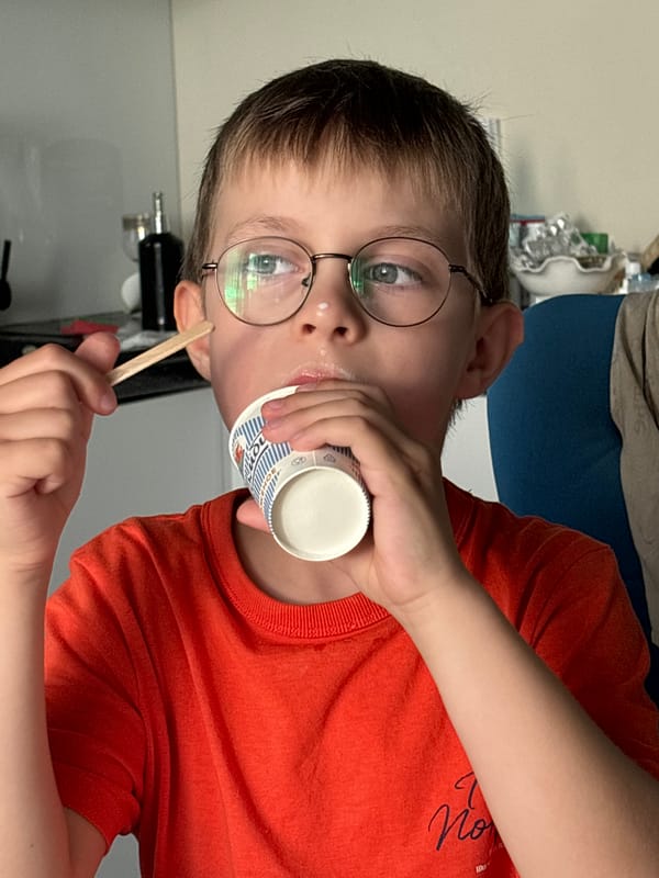 Family afternoon with ice cream and dog in Russian apartment
