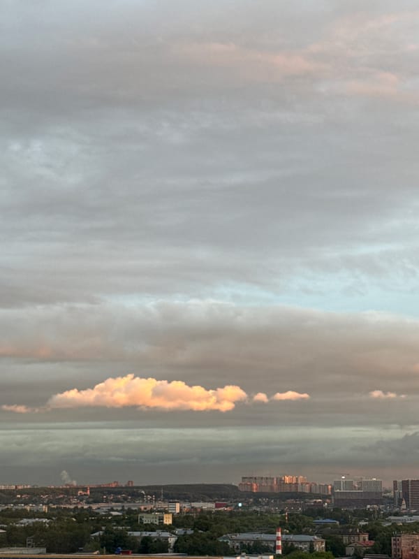 Sunset observed over Lyubertsy cityscape with cloudy skies