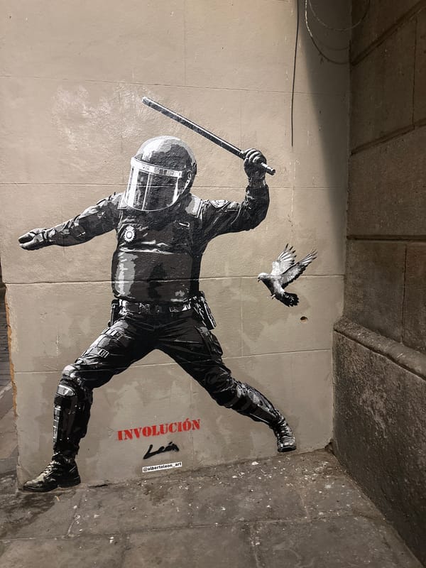 Barcelona street art and illuminated Arc de Triomf documented