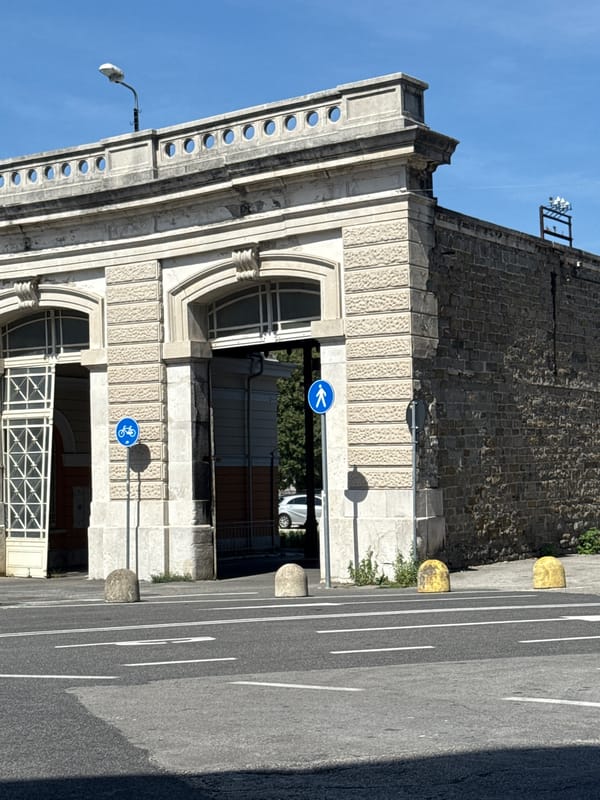 Casual portraits and architecture near a Trieste building