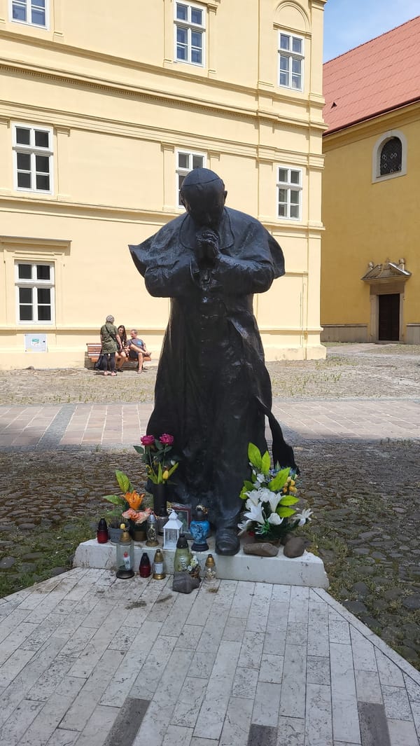 Morning scenes documented across Prešov, Slovakia include statue and construction