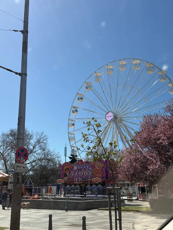 Morning scenes captured across Sofia including Ferris wheel and university