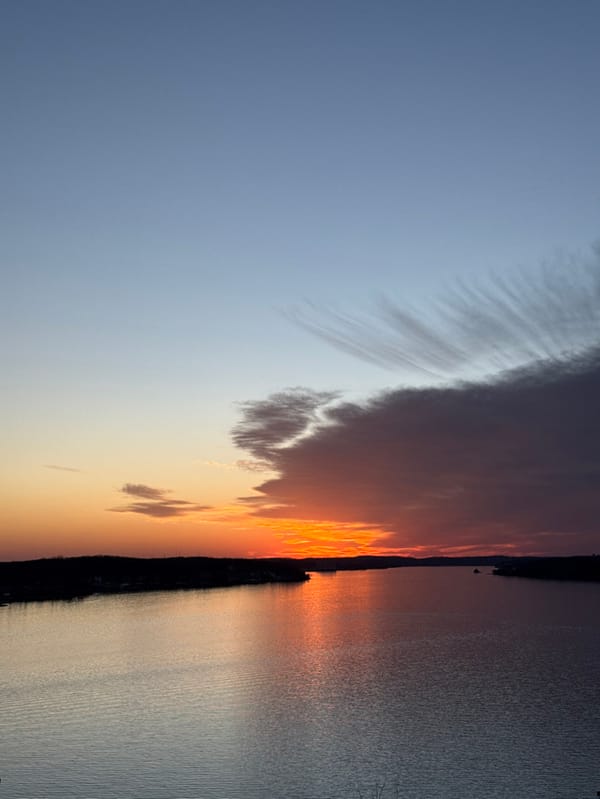 Sunset photographed over water near Lake Ozark, Missouri