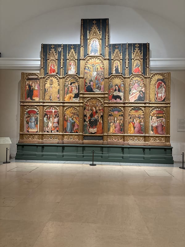 Visitor documents religious artworks at Madrid's Prado Museum