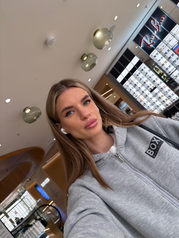 Woman takes selfie in Berlin shopping mall