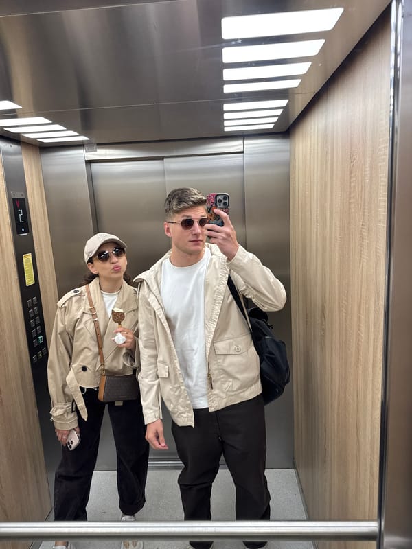 Two people photographed in elevator and outdoors in Plovdiv