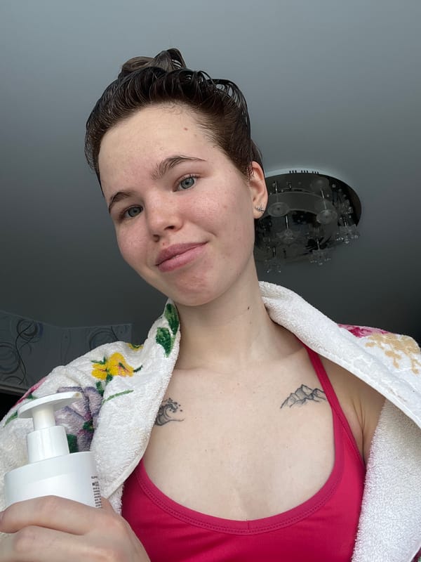 Woman documents morning routine with cat in Chaikovsky