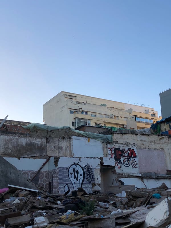 Partially demolished building observed in Casablanca showing graffiti remains