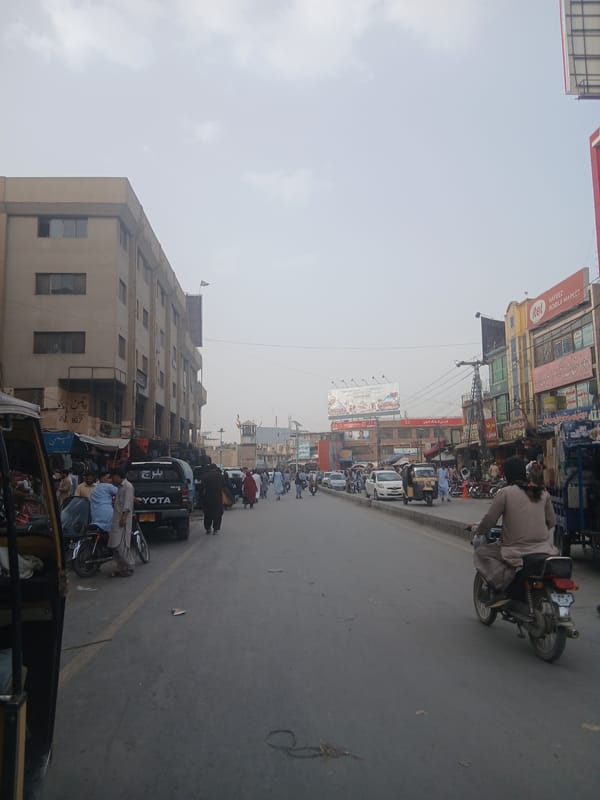 Everyday street life documented across Quetta, Pakistan during midday