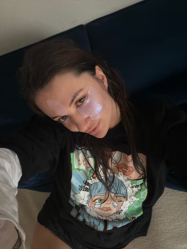 Woman relaxes with eye patches, red velvet cake in Belgrade