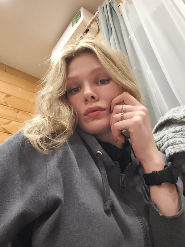 Woman Takes Selfie in Russian Village