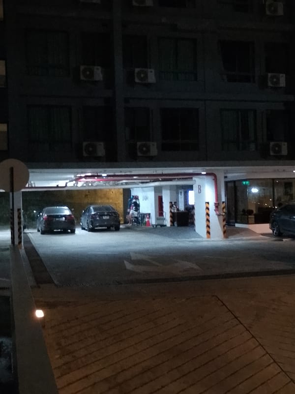 Nighttime street and parking scene in Phuket City