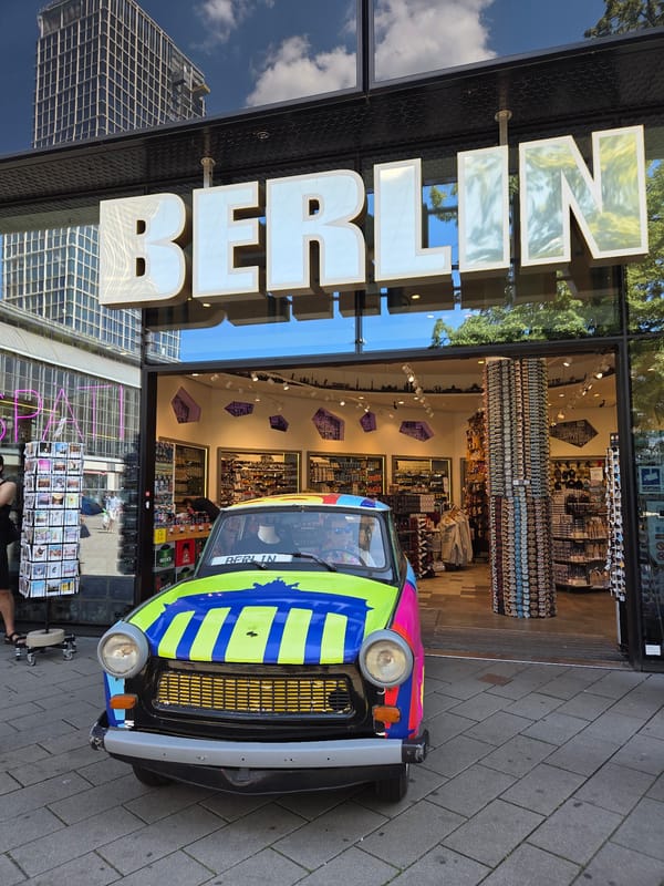 Colorful Trabant parked outside a Berlin souvenir shop