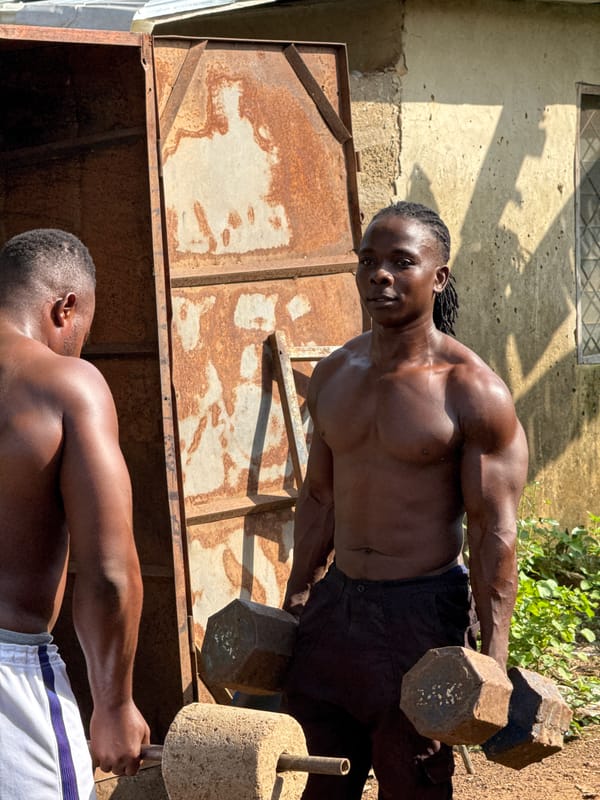 Outdoor gym session with homemade weights in Akwanga, Nigeria