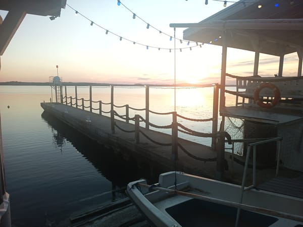 Sunset dock scene captured by lake in Burgas, Bulgaria