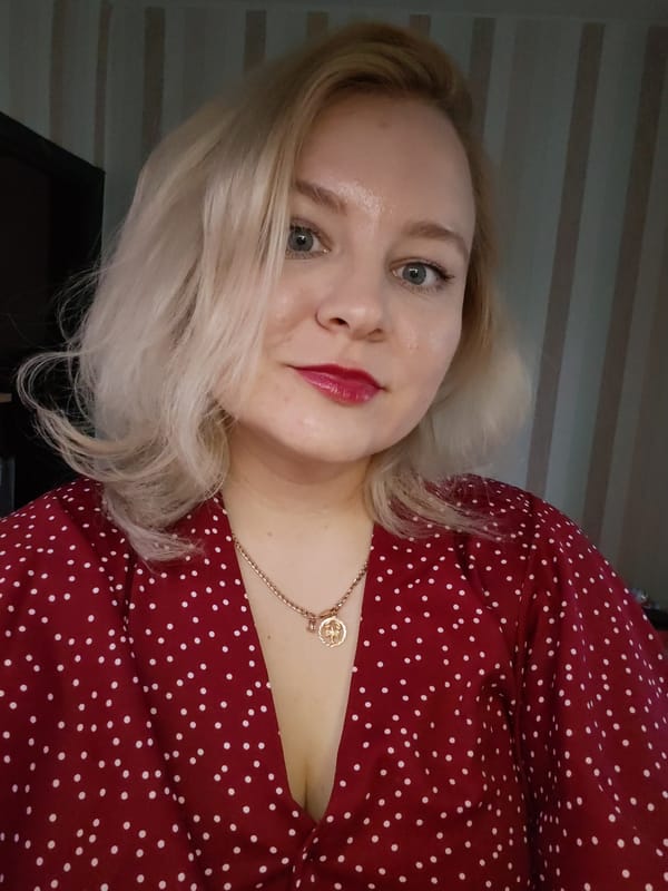 Woman photographs herself indoors in Izhevsk, Russia