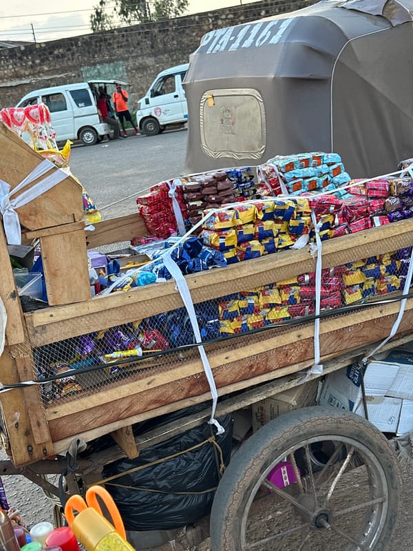Bukuru street life: markets, traffic, and cattle after dark