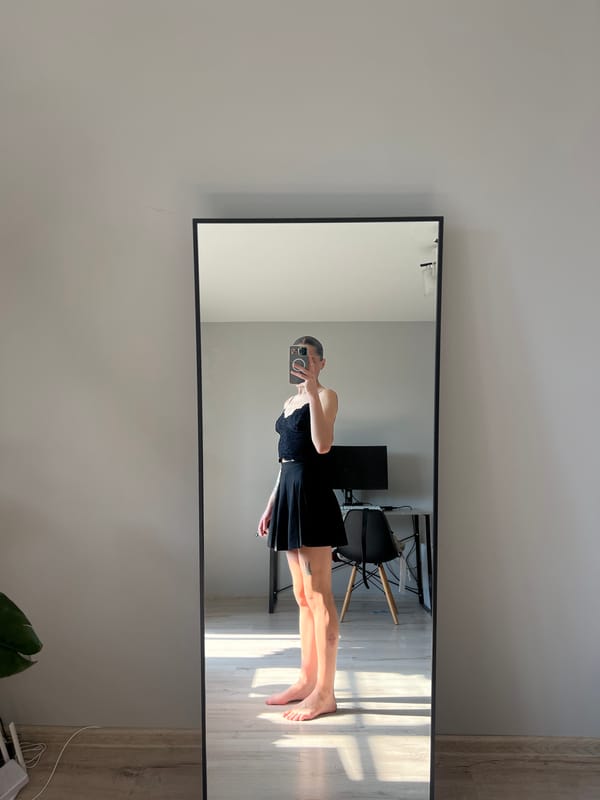 Mirror selfie in a sunlit room in Ternopil