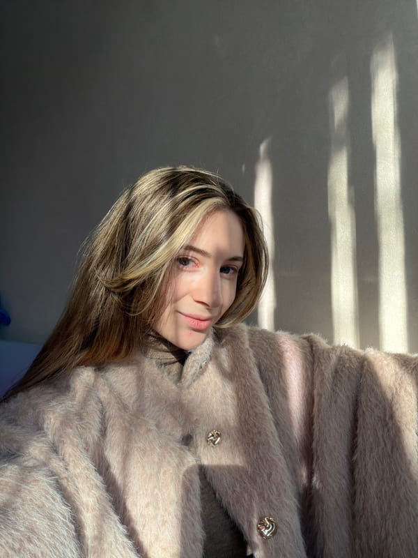 Woman photographs herself indoors in Plovdiv, Bulgaria