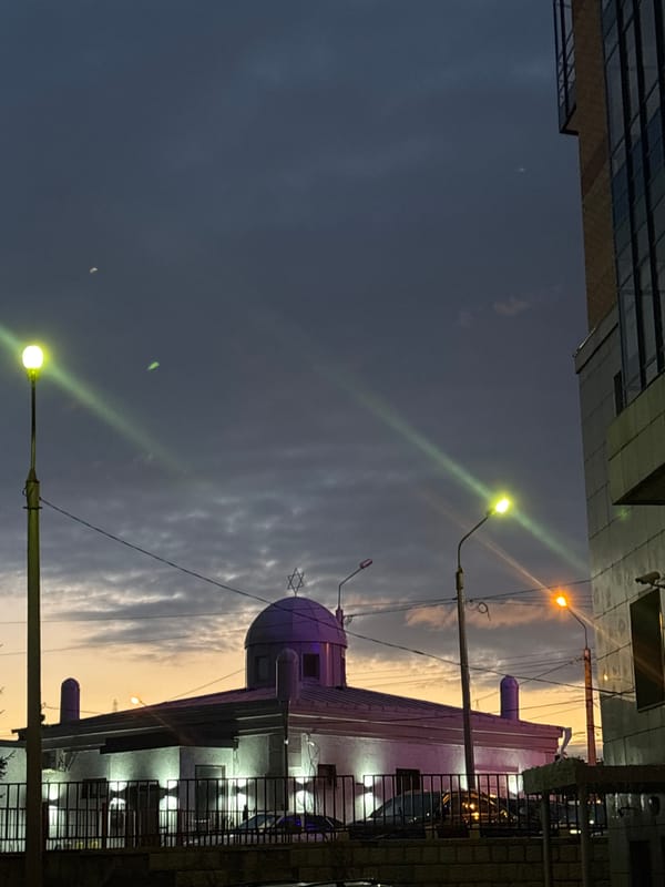 Twilight urban scene photographed from ground level in Krasnoyarsk