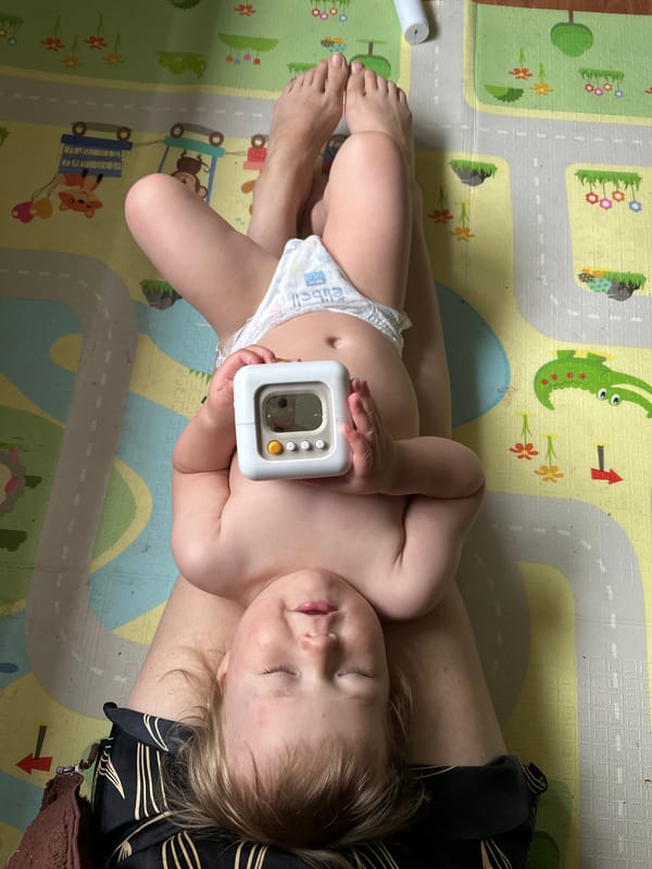Early morning playtime captured between parent and toddler
