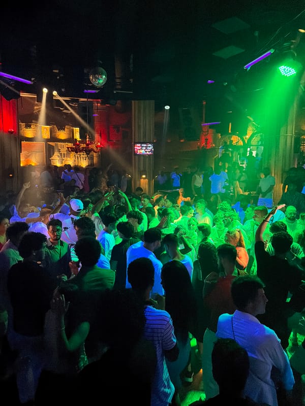 Crowded nightclub night in Sharm El Sheikh under disco lights