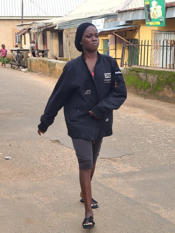 Afternoon foot traffic through Jos residential streets
