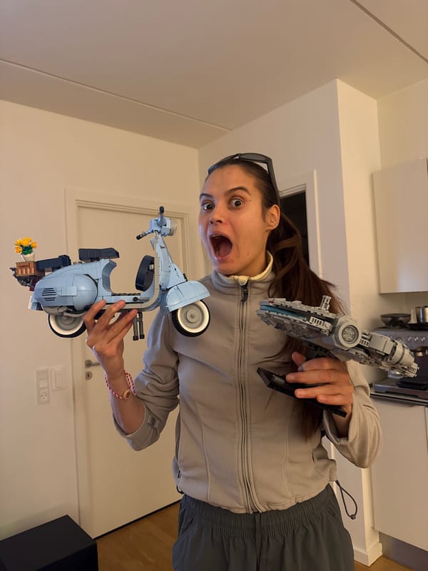 Woman celebrates with Lego Millennium Falcon in Copenhagen