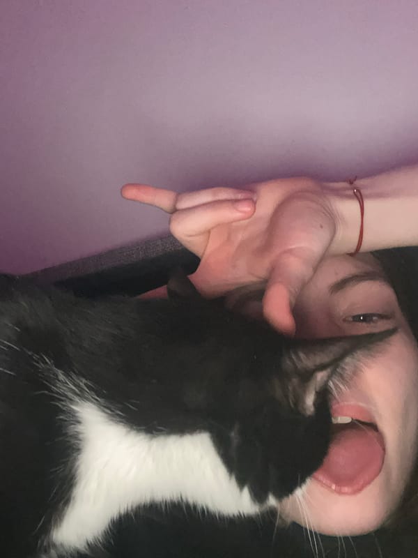 Person photographed with tongue out in Saint Petersburg apartment