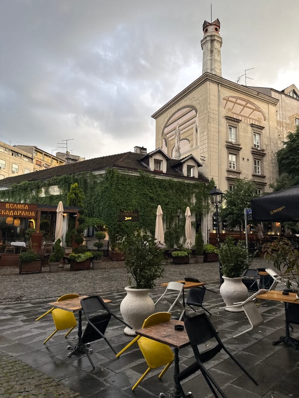 Woman photographs Belgrade streets and abandoned building Sunday afternoon