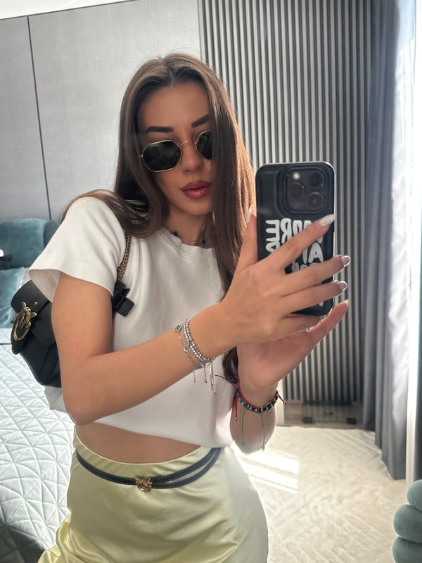 Mirror selfies in a Sofia apartment, casual outfit check
