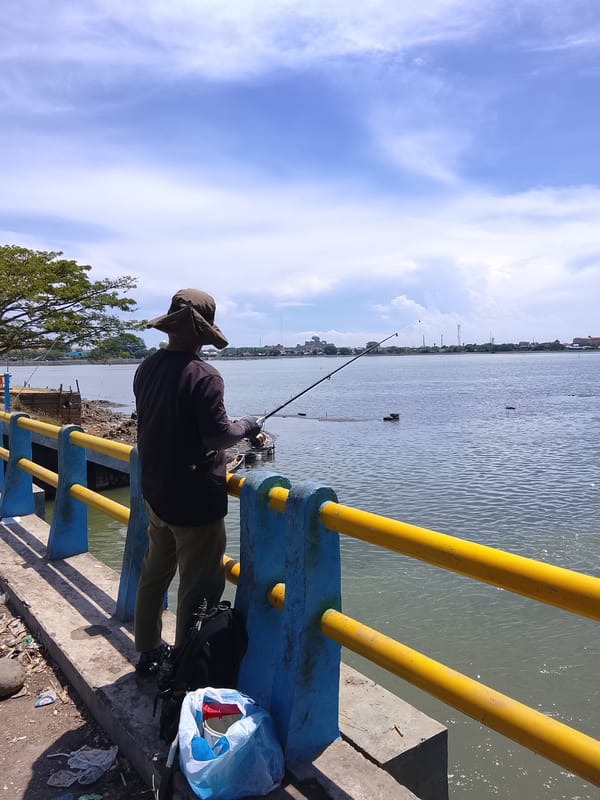 Quiet morning fishing and waterfront life in Lhokseumawe
