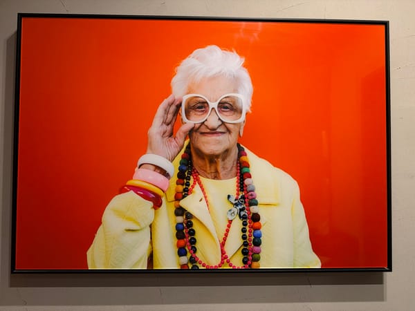 Framed portrait of elderly woman displayed on Sofia wall