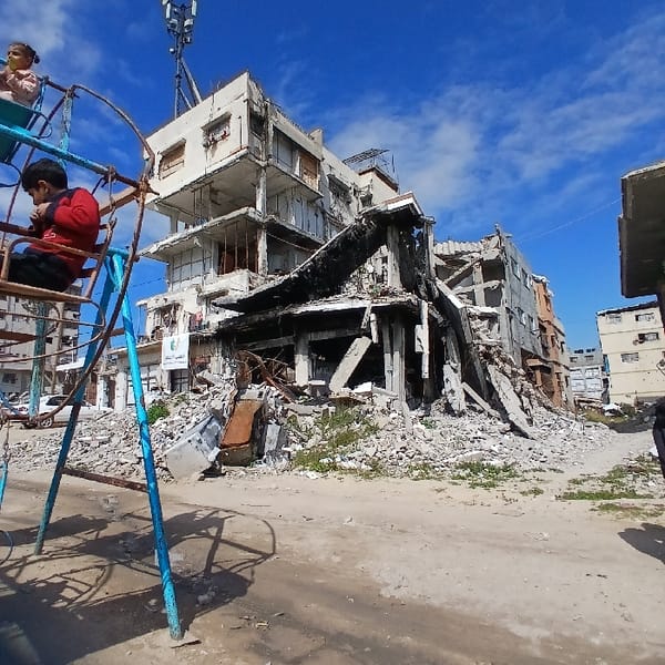 Children play amid urban destruction in Gaza City