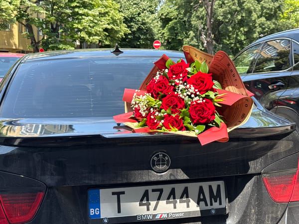 Rose bouquet placed on BMW trunk in Varna