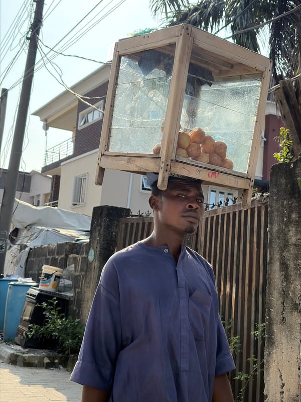 Street life and labor in Igboefon on a July afternoon