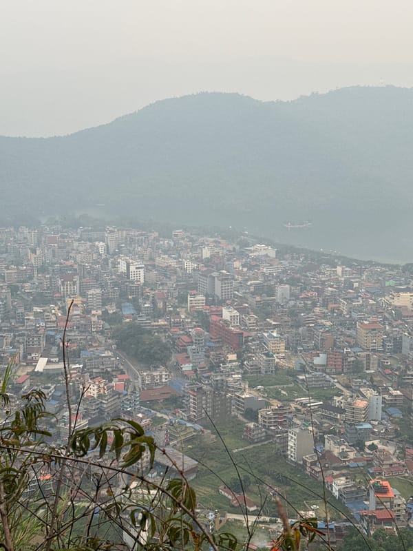 Hazy aerial views captured of lakeside Pokhara, Nepal