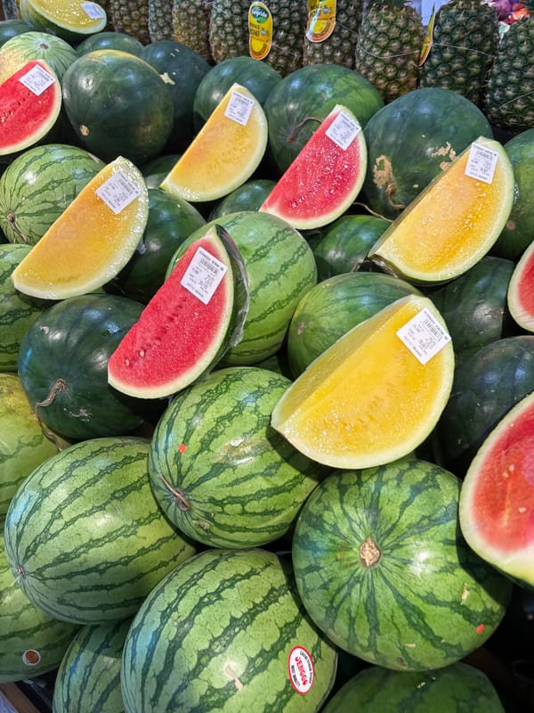 Fresh produce and street scenes at a Kuta Selatan market