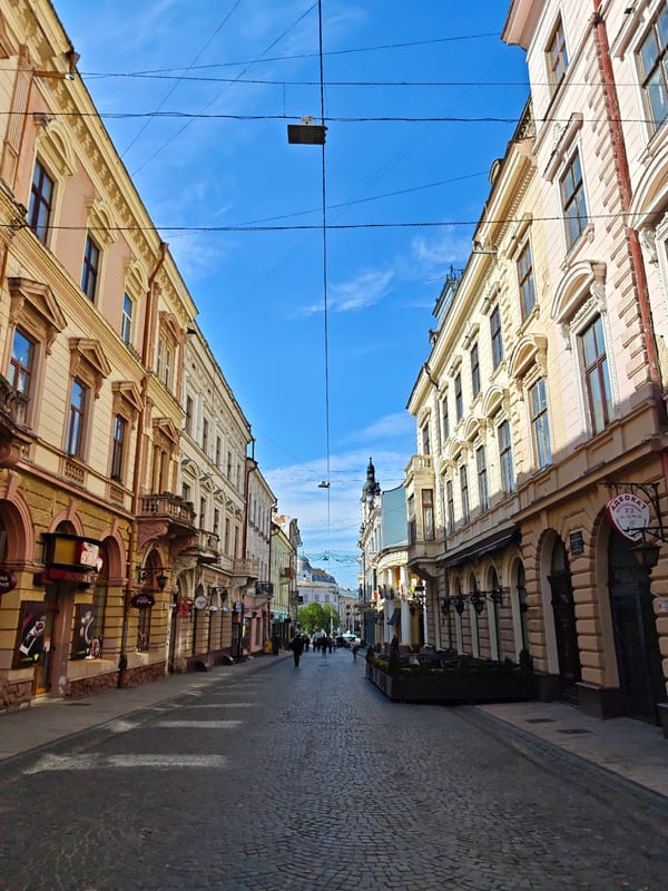 Afternoon stroll documented through historic Chernivtsi streets and architecture