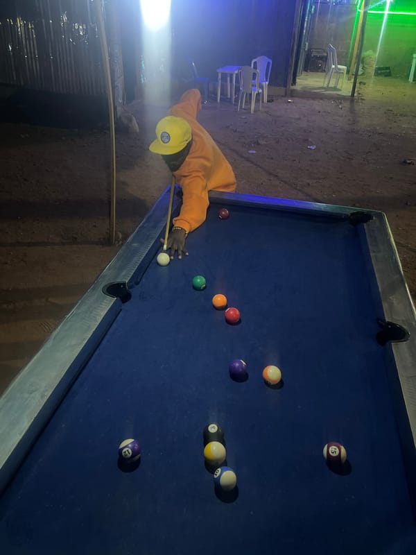 Nighttime billiards game observed in Gura Top, Nigeria