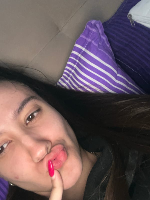 Woman takes morning selfies in bedroom in Varna