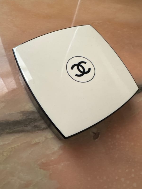 Luxury compact and laptop with video call observed in Milan