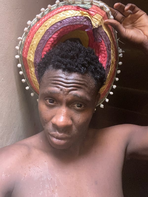 Young person photographed resting indoors in Bukuru, Nigeria